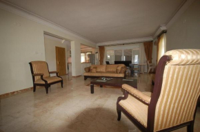 Riverside Triplex Villa with Garden & Pool